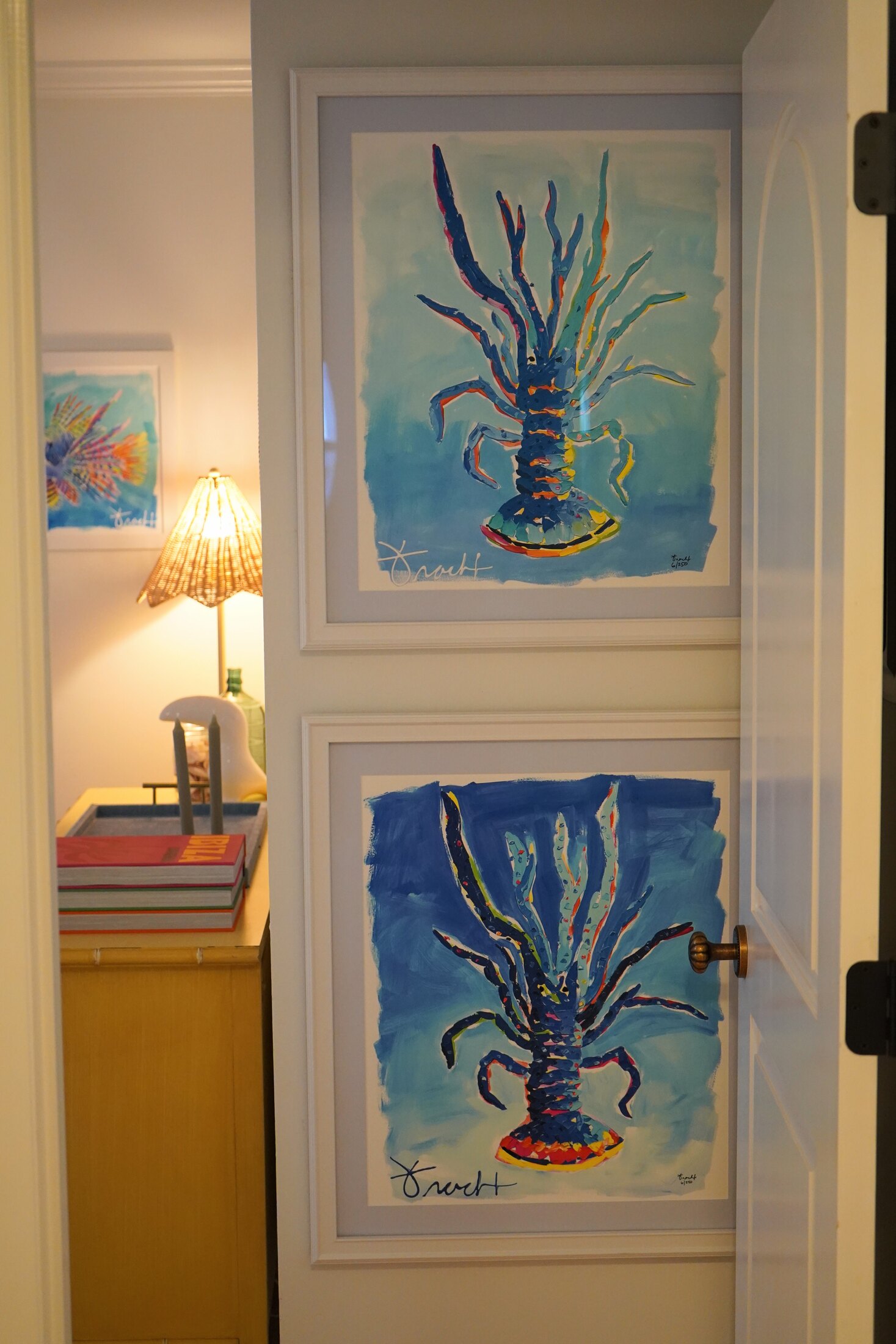 Colorful lionfish artwork displayed inside the cottage
