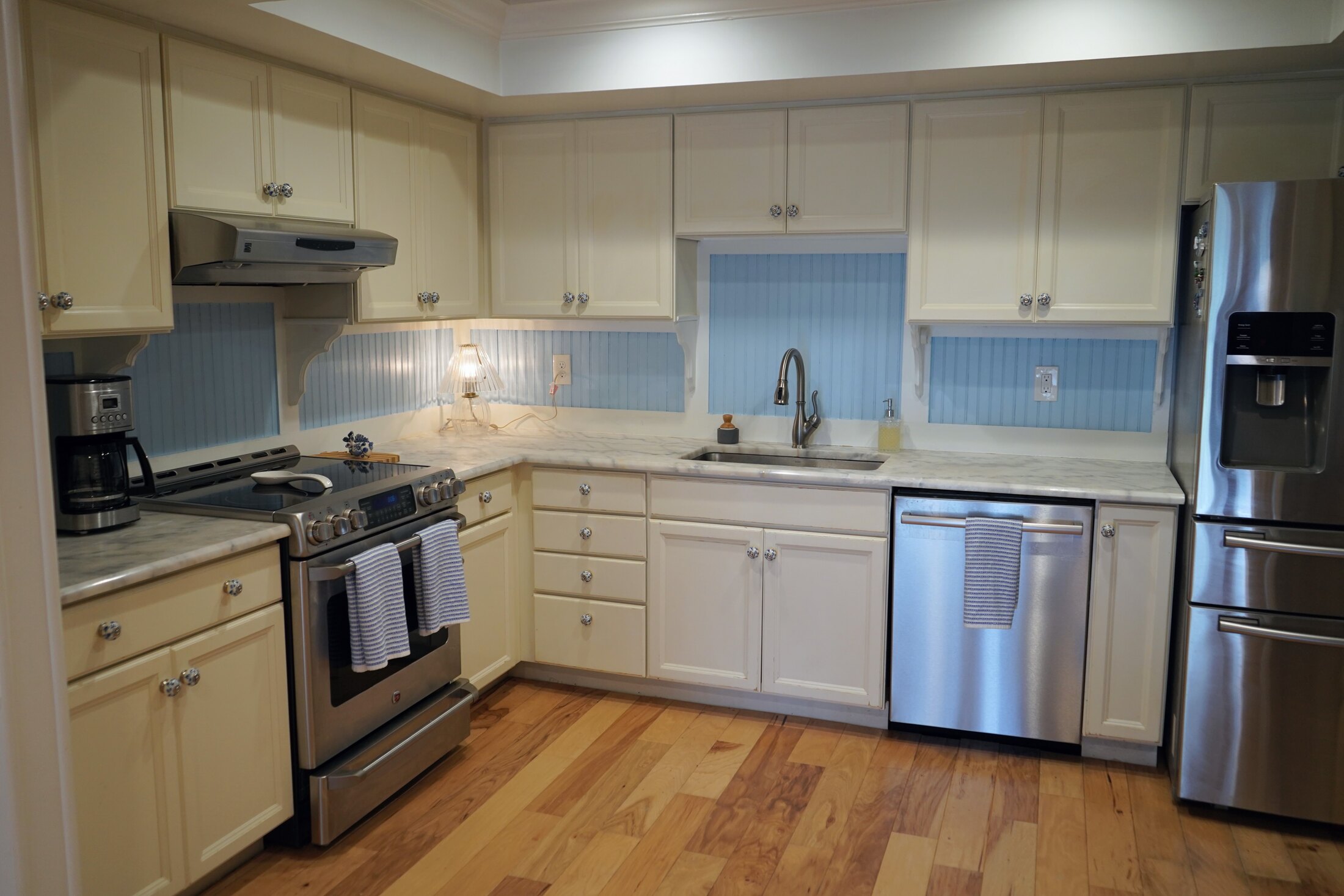 Full kitchen with stainless steel appliances
